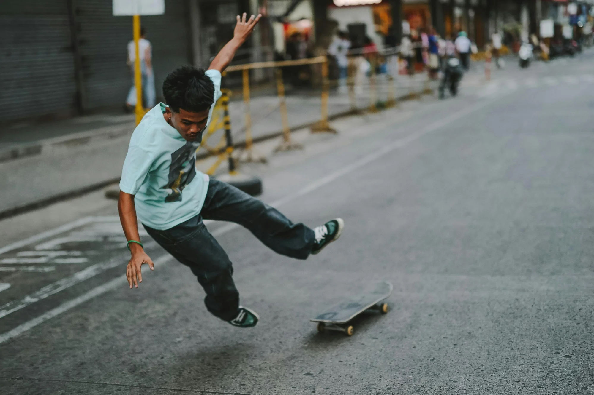 Person falling off skateboard
